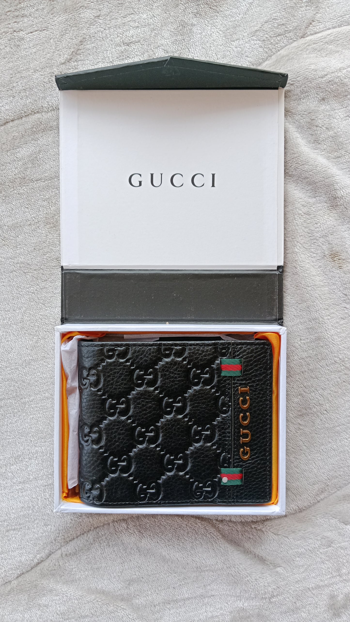 Gucci Small Embossed Logo Genuine Leather Wallet